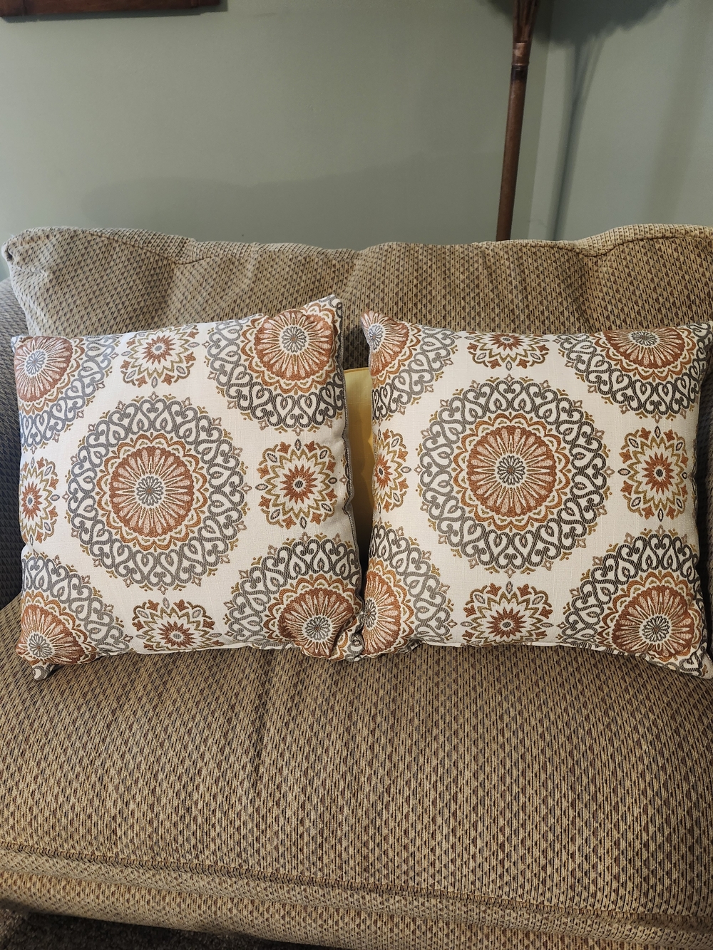 Decorative Medallion Throw Pillow Pair in Cream and Rust